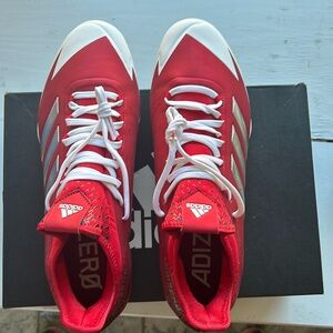 Men’s Adidas Baseball Cleats; Red size 13.5. New in box.